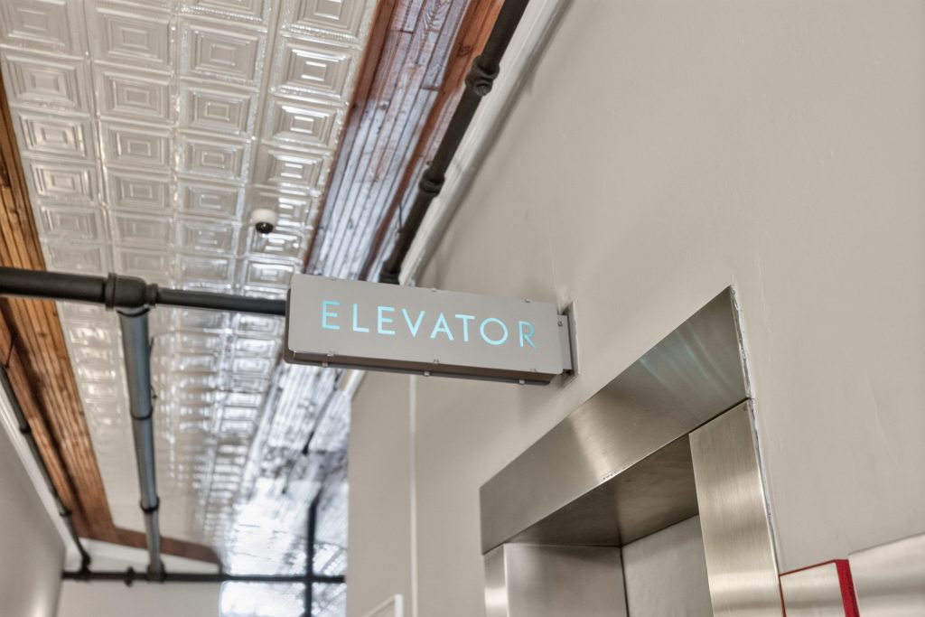 Belk Hudson Lofts elevator sign, Moultrie, GA