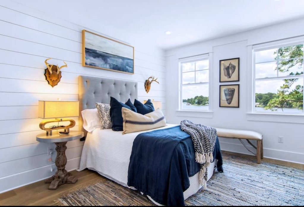 King bedroom with blue bedding at the Lake Blackshear vacation home, Warwick, GA