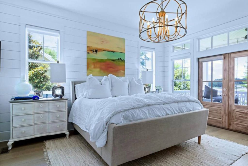King bedroom with chandelier at the Lake Blackshear vacation home, Warwick, GA