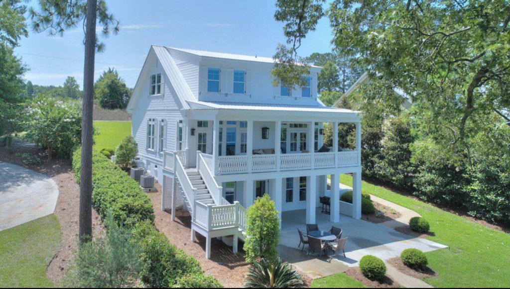 Lake Blackshear vacation home with exterior stairs and covered porches, Warwick, GA